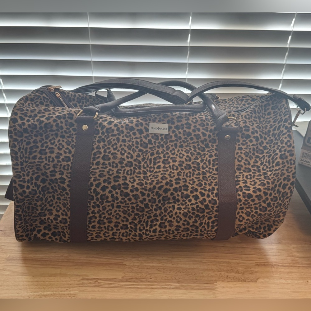 Jane Marie Duffle bag. Leopard print. NWT